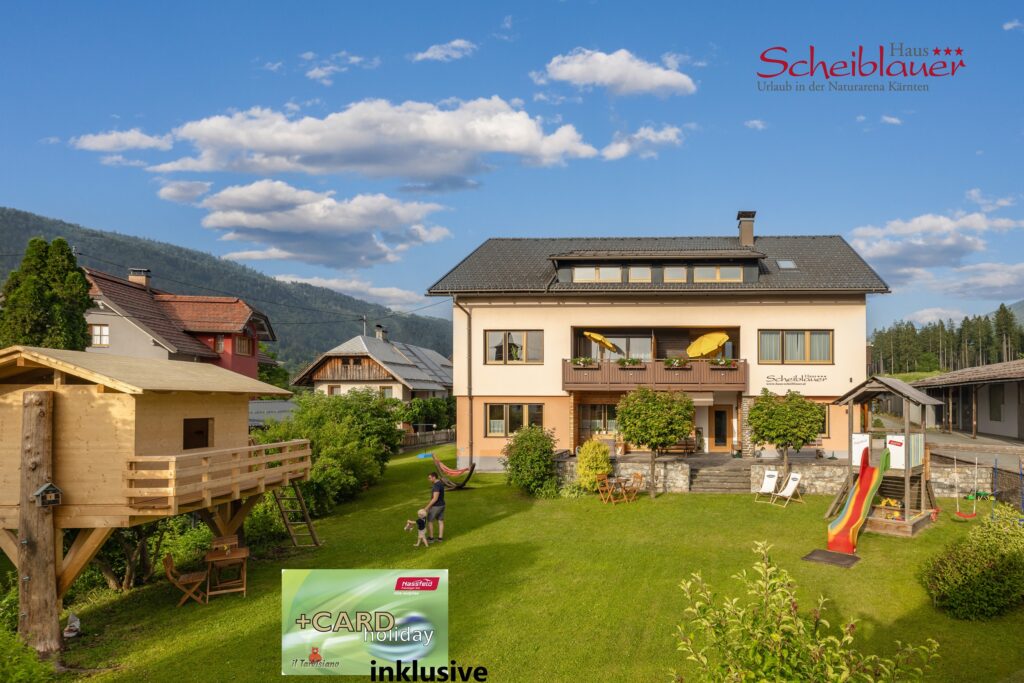 haus-scheiblauer-hiking-summer-+card-family-apartments-nassfeld-view of the house-Hausansicht